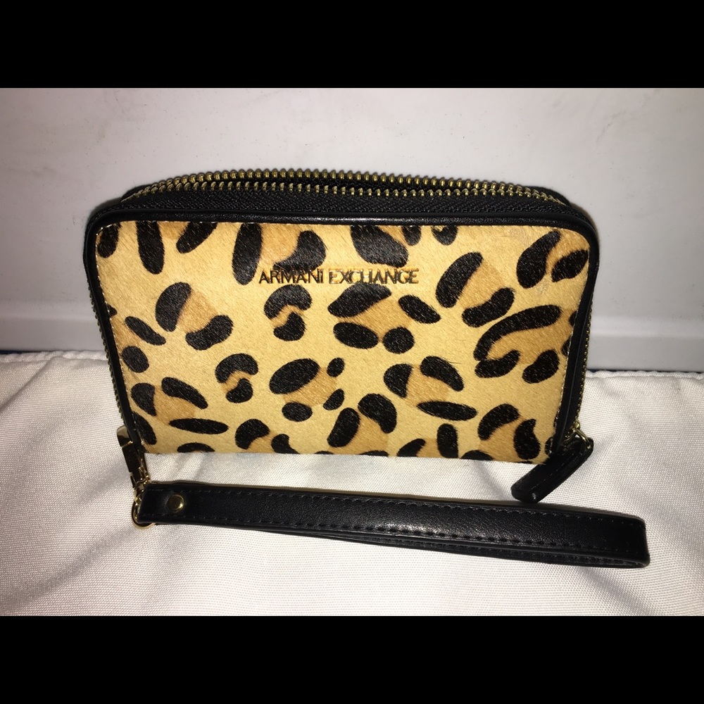 Price✂️  Amani Exchange Wristlet